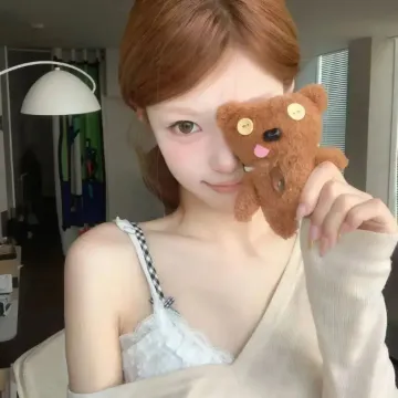梁女士